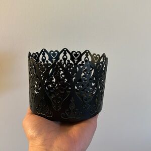 Black candle holder.